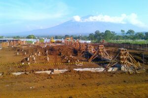 Civil engineering services by PT Ikanindo Rekatama Cipta, specializing in infrastructure projects such as commercial and residential buildings, roadways, and sewage treatment.